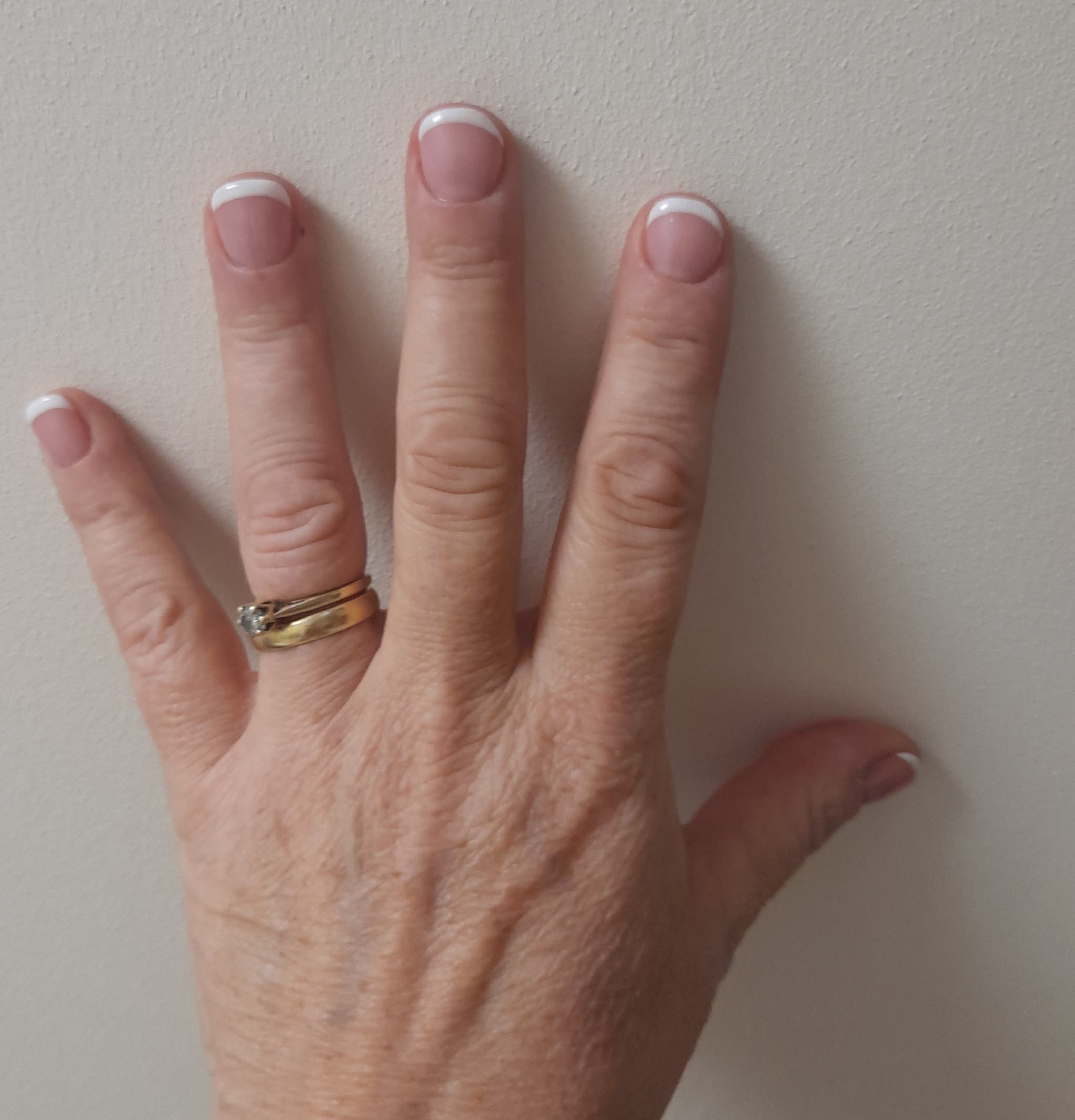 A finished French manicure at Beauty Within